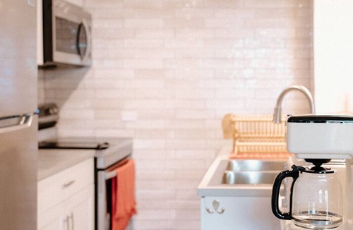 Estate Saint John Apartment | Boho Bungalow- fun stylish apartment close to everything