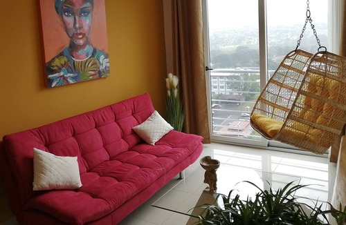 Heredia Apartment | BOHO CHIC STYLE CONDO, NEAR THE AIRPORT W/ SELF CHECK-IN