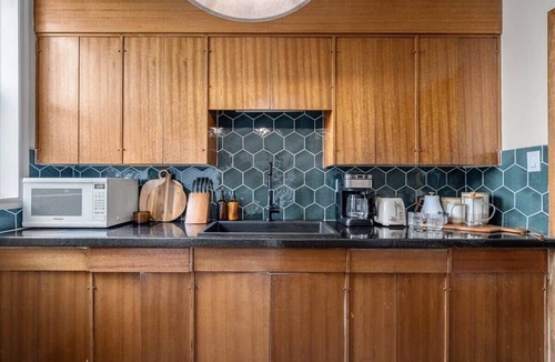 Drumheller Apartment | Bourbon Retro Getaway Sleeps 4 & Full Kitchen!