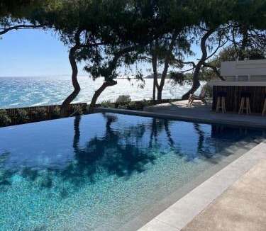 Amoudi Villa | Bozonos Villa - Beachfront Simplicity with Heated Pool