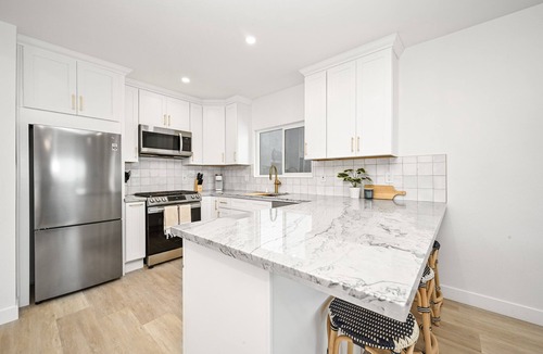 Sunset Beach House | Brand New Home by the Beach & Historic Sunset Water Tower