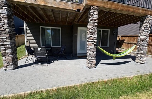 Okotoks House | Brand new spacious 2-bedroom walkout basement suite - Sunshine Oasis