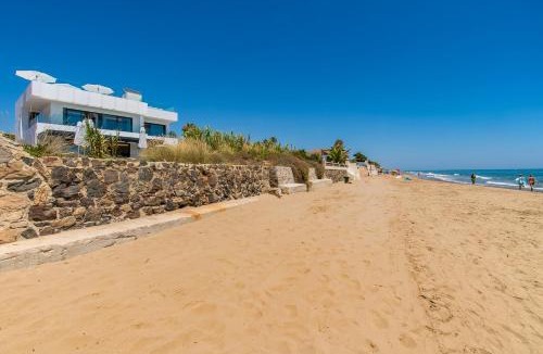 Urbanizacion Costabella Villa | Breath Taking Front Line Beach Villa with Sauna & Jacuzzi