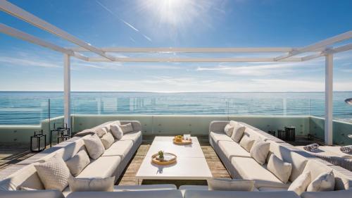 Urbanizacion Costabella Villa | Breath Taking Front Line Beach Villa with Sauna & Jacuzzi