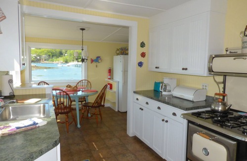 East Boothbay Cottage | Breathtaking Bayfront Cottage perched on the edge of Linekin Bay! Dock! Views!