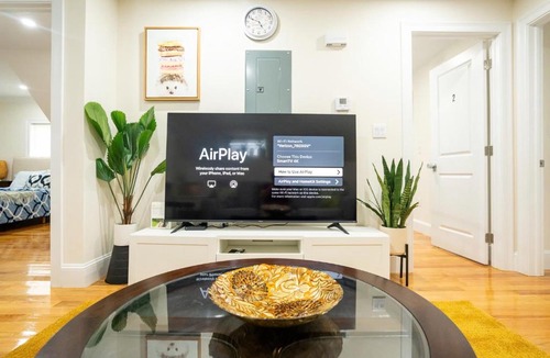 St. Marks Apartment | Breezy 3BR Boston Apt - Bathtub, Parking, TV, Walk to Train 803