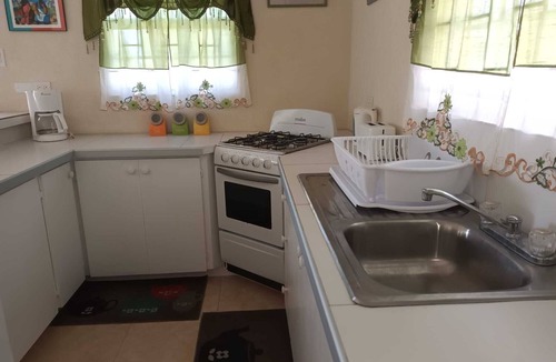 Goodland House | Breezy Bee - Newly Build Air Conditioned Bungalow near Silver Sands Beach