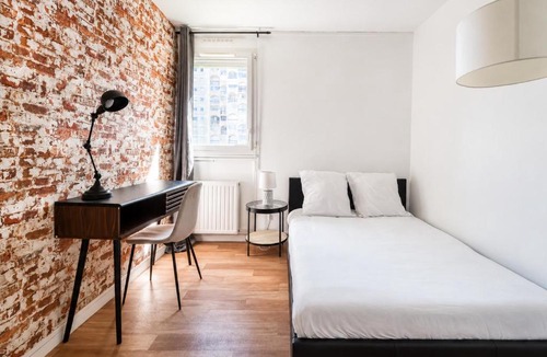 Roseraie - Orgemont Apartment | Brick Loft - Ventilation & Fraîcheur - Parking Gratuit - Idéal Familles - Proche Centre-Ville