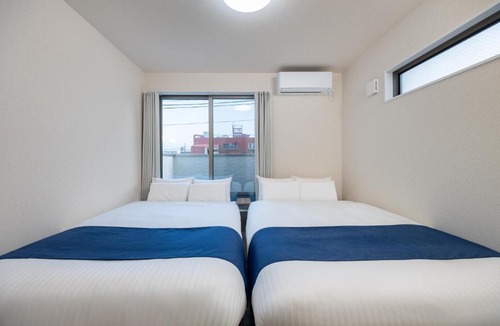 Higashinari Apartment | Bridge Stay Midoribashi - Spacious Stay in Higashinari, Easy Access for Osaka Sightseeing, Brand-New Opening in Higashi-Imazato Area, Sleeps up to 10 Guests