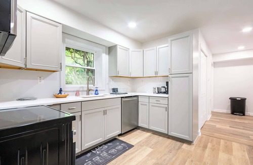 Greensboro Apartment | ‼️Bright 2BR Basement Suite w/Parking & Backyard