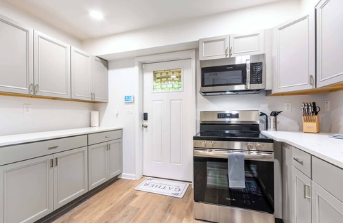 Greensboro Apartment | ‼️Bright 2BR Basement Suite w/Parking & Backyard