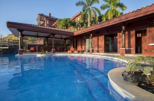 Brasilito House | Bright 2BR Condo with Partial Ocean View - Bougainvillea - Reserva Conchal