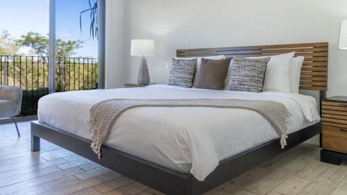 Brasilito House | Bright 2BR Condo with Partial Ocean View - Bougainvillea - Reserva Conchal