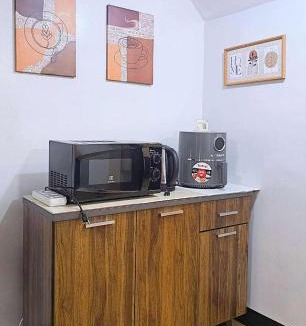 Cainta Apartment | Bright & Airy Loft Cambridge Village Charm