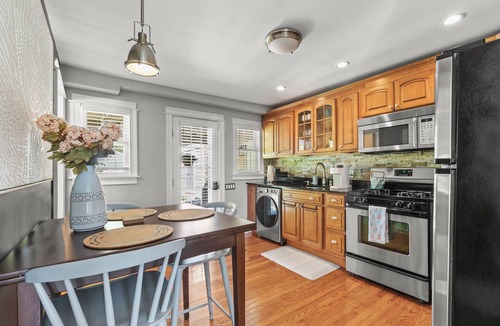 Commercial Street Apartment | Bright and Modern Condo w/Patio, Parking, AC