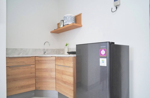 Panunggangan Utara Apartment | Bright And Relaxing 2Br At Collins Boulevard Apartment