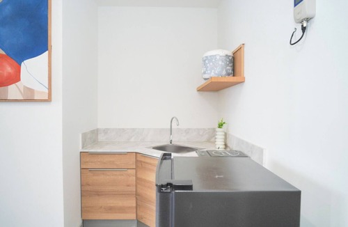Panunggangan Utara Apartment | Bright And Relaxing 2Br At Collins Boulevard Apartment