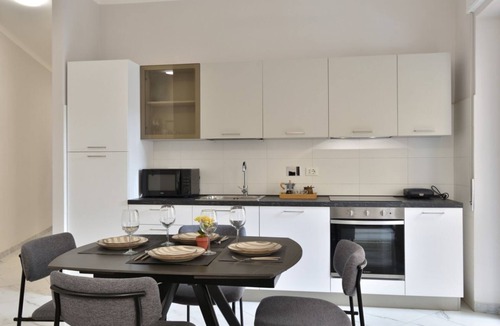 Genoa Apartment | Bright and spacious apartment of approximately 80 square meters, perfect for four people, located on the first floor of a building with an elevator (NOT accessible to disabled guests).The property is located in the Sampierdarena neighborhood, one of the