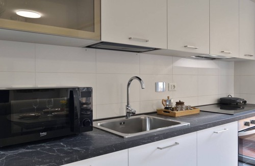 Genoa Apartment | Bright and spacious apartment of approximately 80 square meters, perfect for four people, located on the first floor of a building with an elevator (NOT accessible to disabled guests).The property is located in the Sampierdarena neighborhood, one of the