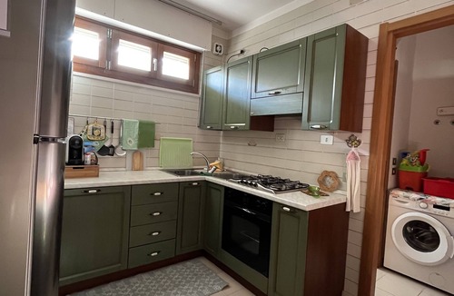 Fertilia Apartment | BRIGHT APARTMENT WITHIN WALKING DISTANCE FROM THE SEA