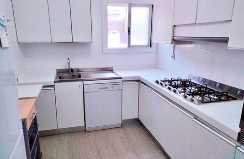 Canet de Mar Apartment | Bright 'Bruc Beach' Apartment with Private Pool, Wi-Fi & Air Conditioning