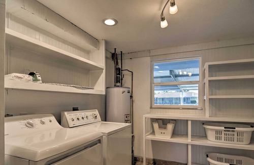 Whitney Beach Cottage | Bright Canalfront House w/ Pool in San Remo Shores