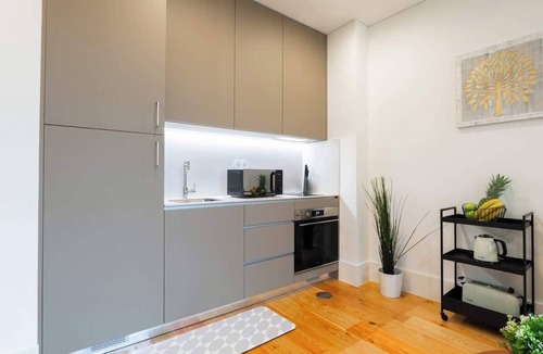 Oliveira do Castelo Apartment | Bright & Cozy Flat w/Balcony by Host Wise