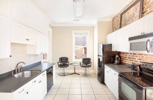 Historic District - North Apartment | Bright Downtown Loft Amidst Nightlife Near City Market by Lucky Savannah