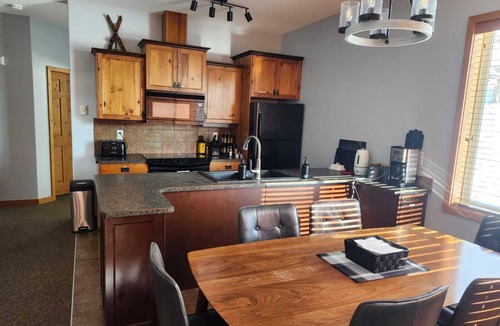 Big White Ski Resort Ski Chalet | Bright End unit Townhome, priv. hot tub, 2 parking, ski in/out, close village