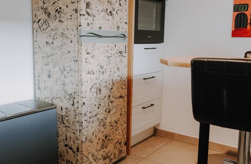Nuttlar Apartment | Bright first floor apartment (80 m2) for 4 people with fireplace and garden