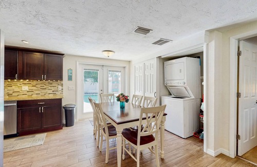 Pinellas Park House | Bright Home with Private Pool High Speed WiFi Firepit Outdoor Bar and Grill