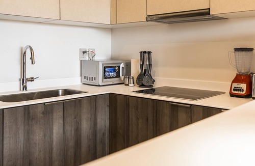 Playa Paraiso Apartment | Bright modern escape with rooftop pool, private jacuzzi hot tub and WiFi