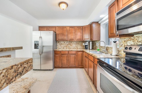Harbor Village House | Bright Oasis Home w Pool & Palm Trees Near Beach!