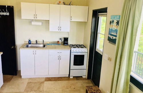 Estate Enighed Apartment | Bright Ocean View Studio - AC, Wi-Fi, generator 1 mile to Cruz Bay