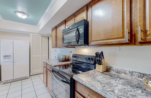 South Patrick Shores Condo | Bright & Spacious 3BR Condo by the Sea — Private Balcony + Oceanfront Pool! 🌴