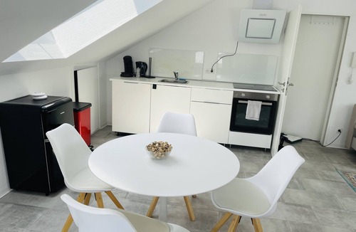 Karthause Condo | Bright, spacious attic apartment.