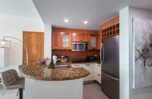 Puerta de Tierra Apartment | Bright Studio with Balcony & Hot Tub Access