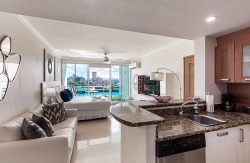 Puerta de Tierra Apartment | Bright Studio with Balcony & Hot Tub Access