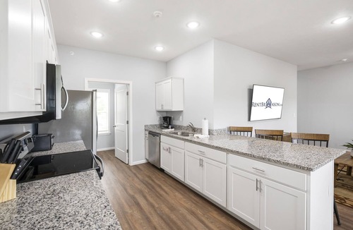 Branson West Condo | Bright Upgraded Decor with Hot Tub, Deck, Arcade, Free Tickets & Onsite Ledgestone Golf