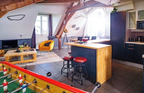 Republique Apartment | British Style, projector, foosball & right in the heart of downtown