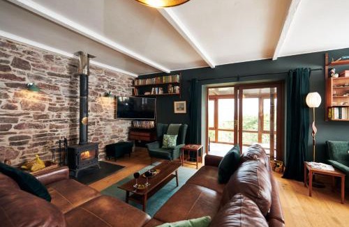Llanybri House | Brofallen - Spacious bunglaow with distant sea views and enclosed garden