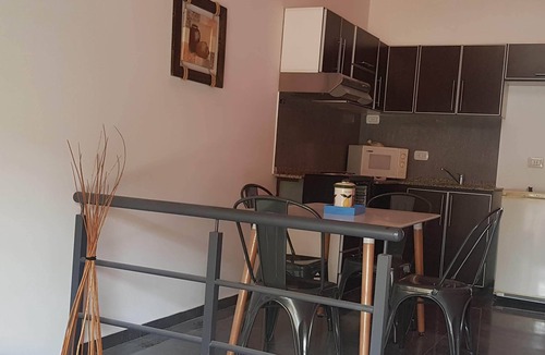 Moreno Apartment | brown apartment complex