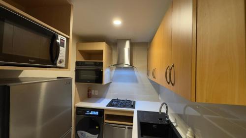 Browns Bay Apartment | Browns bay by the beach
