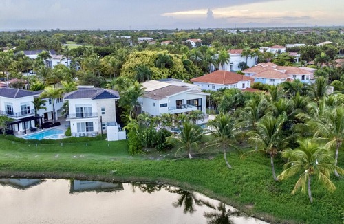 Bavaro Villa | Buganvilla Mansion: 2 amazing lakefront villas w/pools, gym, games, & staff