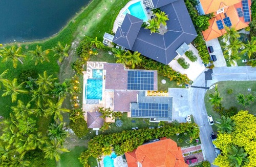 Bavaro Villa | Buganvilla Mansion: 2 amazing lakefront villas w/pools, gym, games, & staff