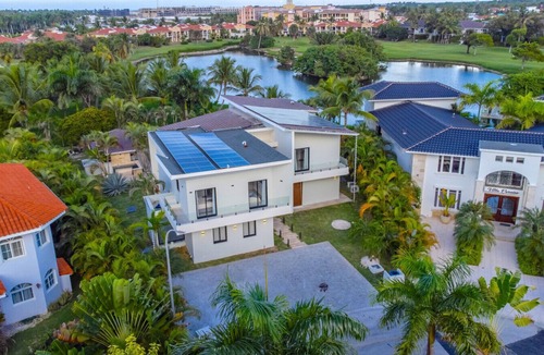 Bavaro Villa | Buganvilla Mansion: 2 amazing lakefront villas w/pools, gym, games, & staff