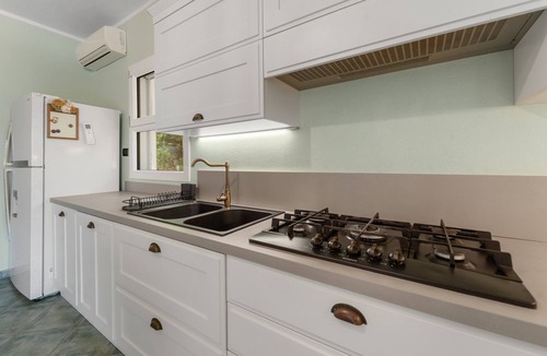 Buggerru House | Buggerru Hugo Holiday Home with Sea View, Private Terrace and Air Conditioning
