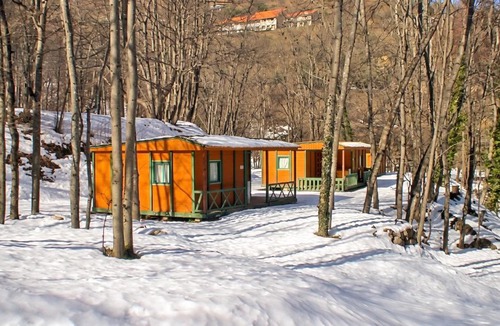 Escaro House | Bungalow confortable à Escaro avec piscine partagée