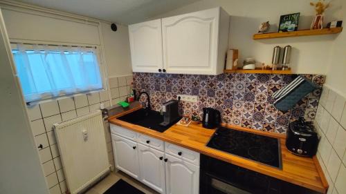 Niederzwehren Apartment | Bungalow mit Garten