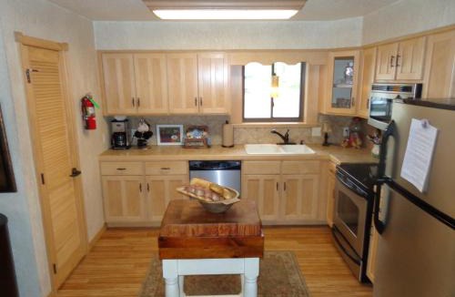 Mount Ida House | C23 - Lake view two bedroom, two bath log-sided cottage with private hot tub overlooking Lake Ouachita